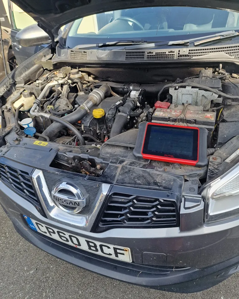 MOT check in side of Nissan car